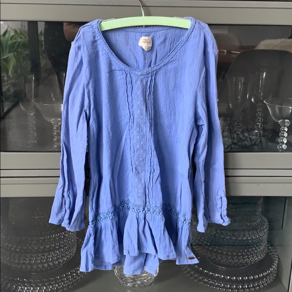 Girls blue O’Neill long sleeve shirt.